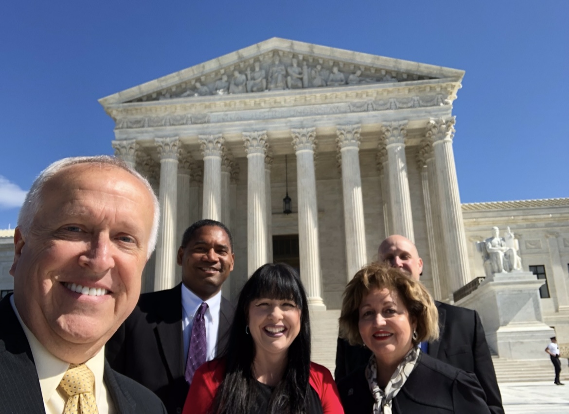Victor Arias at the U.S. Supreme Court in Washington, D.C. with fellow Suncoast Credit Union board members advocating for FL-19 families